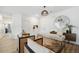 Spacious living area featuring a work space and hardwood floors at 420 Carolina Cherry Ct # 202, Charleston, SC 29414