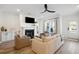 Comfortable living room with fireplace and sliding glass doors at 420 Carolina Cherry Ct # 202, Charleston, SC 29414