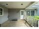Wooden back porch with access to the backyard at 200 Old Postern Rd, Summerville, SC 29483