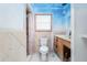 Small bathroom with painted ceiling, shower, and wood vanity at 200 Old Postern Rd, Summerville, SC 29483