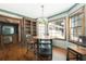 Dining area with built-in shelving and a round table at 200 Old Postern Rd, Summerville, SC 29483