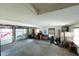 Large garage with various items, including a motorcycle and workbench at 200 Old Postern Rd, Summerville, SC 29483