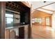Home bar with wet bar and shelving at 200 Old Postern Rd, Summerville, SC 29483