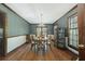 Formal dining room with wood flooring and vintage wallpaper at 200 Old Postern Rd, Summerville, SC 29483