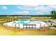 Community pool with adjacent lounge area at 177 Carolina Groves Blvd, Moncks Corner, SC 29461