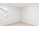Simple bedroom with large window and carpeted floor at 281 Blue Haw Dr, Moncks Corner, SC 29461