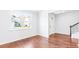 Spacious entryway with hardwood floors, large windows, and staircase at 281 Blue Haw Dr, Moncks Corner, SC 29461