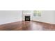 Living room with corner fireplace and hardwood floors at 281 Blue Haw Dr, Moncks Corner, SC 29461