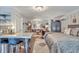 Open concept studio with living, sleeping, and kitchen areas at 705 S Magnolia St, Summerville, SC 29483