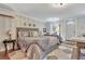 Spacious main bedroom with a comfortable bed and stylish decor at 705 S Magnolia St, Summerville, SC 29483