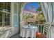 Cozy porch with table and chairs, perfect for enjoying morning coffee at 705 S Magnolia St, Summerville, SC 29483