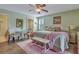 Spacious main bedroom with king-size bed and en-suite bathroom at 705 S Magnolia St, Summerville, SC 29483