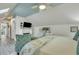 Spacious bedroom with a king-size bed and a fireplace at 705 S Magnolia St, Summerville, SC 29483