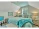 Main bedroom with a king-size bed and soft blue bedding at 705 S Magnolia St, Summerville, SC 29483