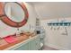 Small bathroom with glass sink and vintage style vanity at 705 S Magnolia St, Summerville, SC 29483