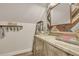 Modern bathroom with glass vessel sink and wood-look vanity at 705 S Magnolia St, Summerville, SC 29483