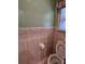 Small bathroom with toilet and decorative tile at 1449 Swamp Angel Ct, Charleston, SC 29412