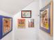 Unique wall art adds character to this home's hallway at 218 E Huron Ave, Folly Beach, SC 29439