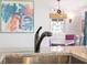 Modern kitchen sink and faucet with granite countertop at 218 E Huron Ave, Folly Beach, SC 29439