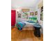 Bright bedroom with built-in bed and colorful decor at 218 E Huron Ave, Folly Beach, SC 29439