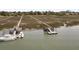 Waterfront property with private dock and boat slips at 218 E Huron Ave, Folly Beach, SC 29439