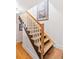 Stylish staircase with a blend of dark and light wood tones at 218 E Huron Ave, Folly Beach, SC 29439