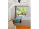 Bedroom with private balcony access and treetop views at 218 E Huron Ave, Folly Beach, SC 29439