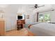 Serene bedroom with private balcony access and treetop views at 218 E Huron Ave, Folly Beach, SC 29439