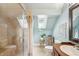 Spa-like bathroom with a walk-in shower and skylights at 933 Mccants Dr, Mount Pleasant, SC 29464