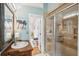 Elegant bathroom with a large walk-in shower and a vanity at 933 Mccants Dr, Mount Pleasant, SC 29464
