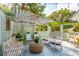 Private backyard patio with comfortable seating and a gas grill at 933 Mccants Dr, Mount Pleasant, SC 29464