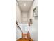 Staircase with wooden handrail leading to upper level at 933 Mccants Dr, Mount Pleasant, SC 29464