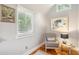 Relaxing reading nook with comfy chair and large artwork at 933 Mccants Dr, Mount Pleasant, SC 29464