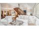 Open living area with a view of the kitchen and staircase at 933 Mccants Dr, Mount Pleasant, SC 29464