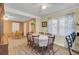 Country style dining room with wood table and chairs, adjacent to kitchen at 1510 Jahnz Ave, Summerville, SC 29485
