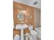 A well-lit bathroom with a pedestal sink and bathtub at 1510 Jahnz Ave, Summerville, SC 29485