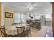 Country style dining room with wood table and chairs, adjacent to kitchen at 1510 Jahnz Ave, Summerville, SC 29485