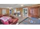 Game room with wood walls and leather sofas at 1510 Jahnz Ave, Summerville, SC 29485