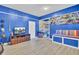 A fun game room with a TV, seating, and sports memorabilia at 1510 Jahnz Ave, Summerville, SC 29485