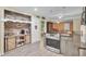 Updated kitchen with a coffee bar and brick accent wall at 1510 Jahnz Ave, Summerville, SC 29485