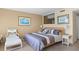 Luxurious main bedroom featuring a king-size bed and en-suite bathroom at 2473 High Hammock Rd, Seabrook Island, SC 29455