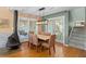 Dining area with hardwood floors and fireplace at 2473 High Hammock Rd, Seabrook Island, SC 29455
