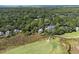 Aerial view showing home's peaceful location near golf course at 2473 High Hammock Rd, Seabrook Island, SC 29455