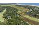 Aerial showcasing coastal location and golf course views at 2473 High Hammock Rd, Seabrook Island, SC 29455