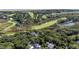 Aerial view showing home's location in a lush, wooded area at 2473 High Hammock Rd, Seabrook Island, SC 29455
