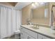 Updated bathroom features a vanity with a beige countertop, white cabinets, and a shower/tub combo at 2473 High Hammock Rd, Seabrook Island, SC 29455