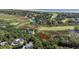 Aerial view highlighting home's proximity to golf course and ocean at 2473 High Hammock Rd, Seabrook Island, SC 29455