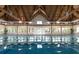 Indoor lap pool with high ceilings at 2473 High Hammock Rd, Seabrook Island, SC 29455