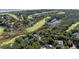 Luxury home nestled in a wooded area near the golf course at 2473 High Hammock Rd, Seabrook Island, SC 29455