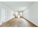Open concept living area with wood-look flooring at 756 Long Bluff Rd, Summerville, SC 29486